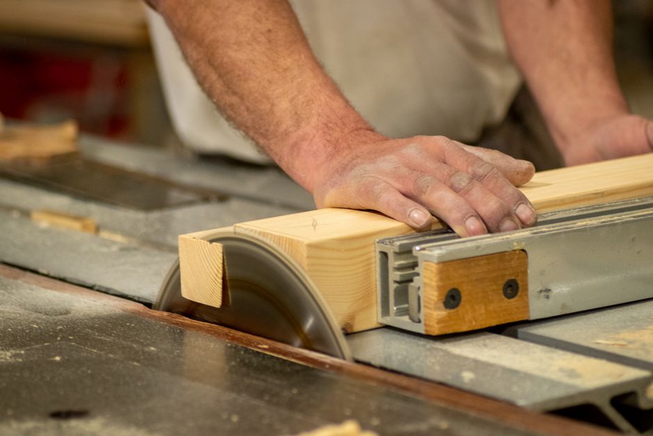 Skilled carpenter handcrafting premium kitchen cabinets